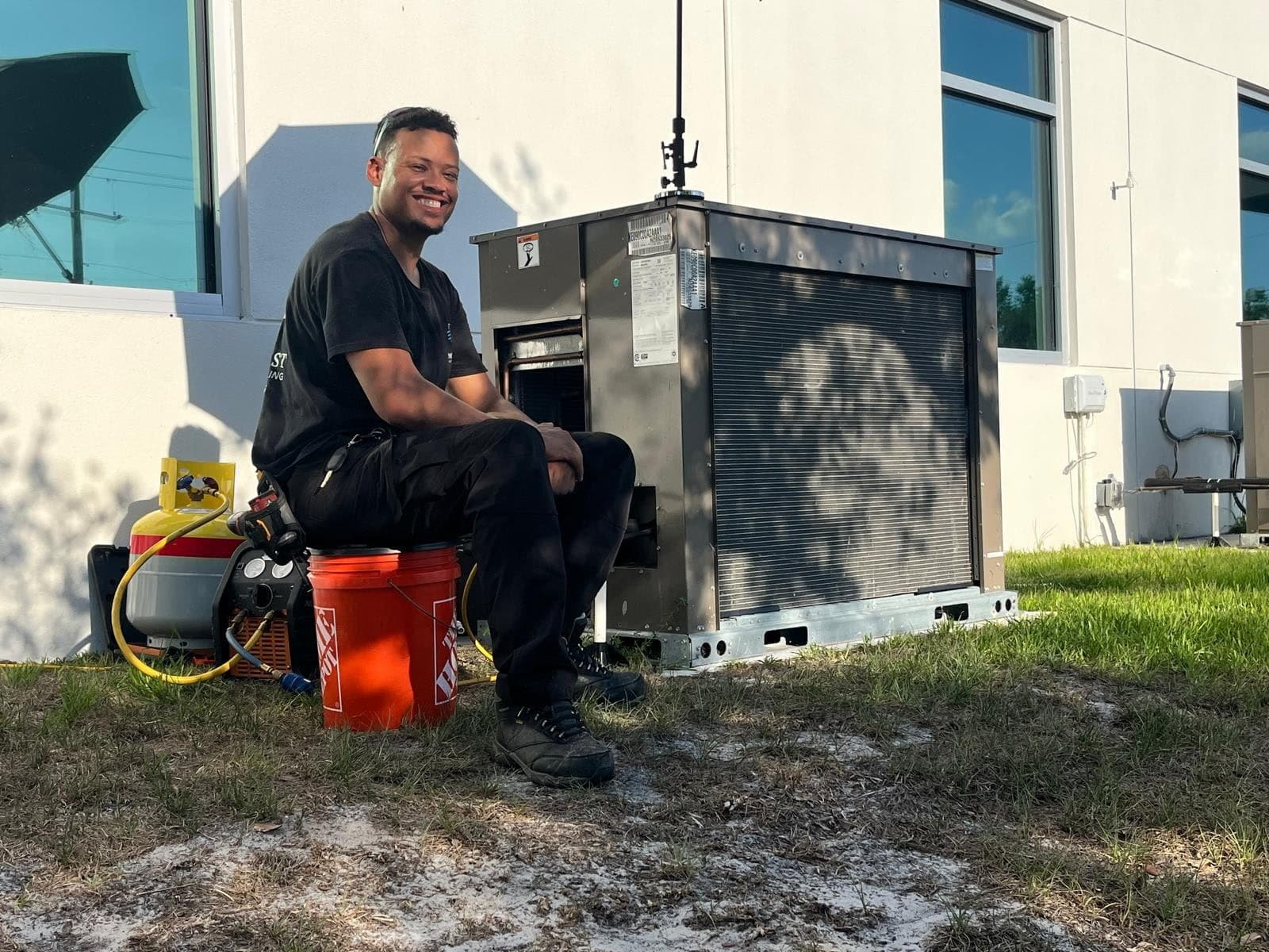 Chris Grullon, owner of North East Heating And Cooling, on a Tampa Bay job site